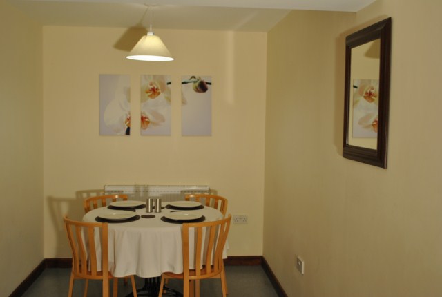 2 Bed Room Holiday Cottage Dinning Room at the Acland Self-catering Accommodation, Stogursey, Bridgwater, Somerset