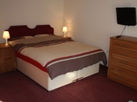 Bedroom for the Hinkley accommodation at the Acland Apartments Stogursey Bridgwater Somerset